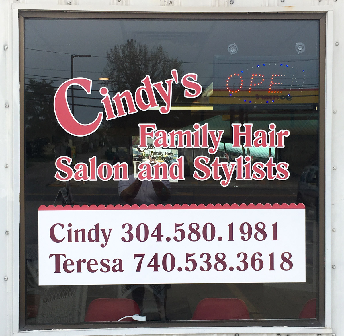 window lettering and graphics for hair salon