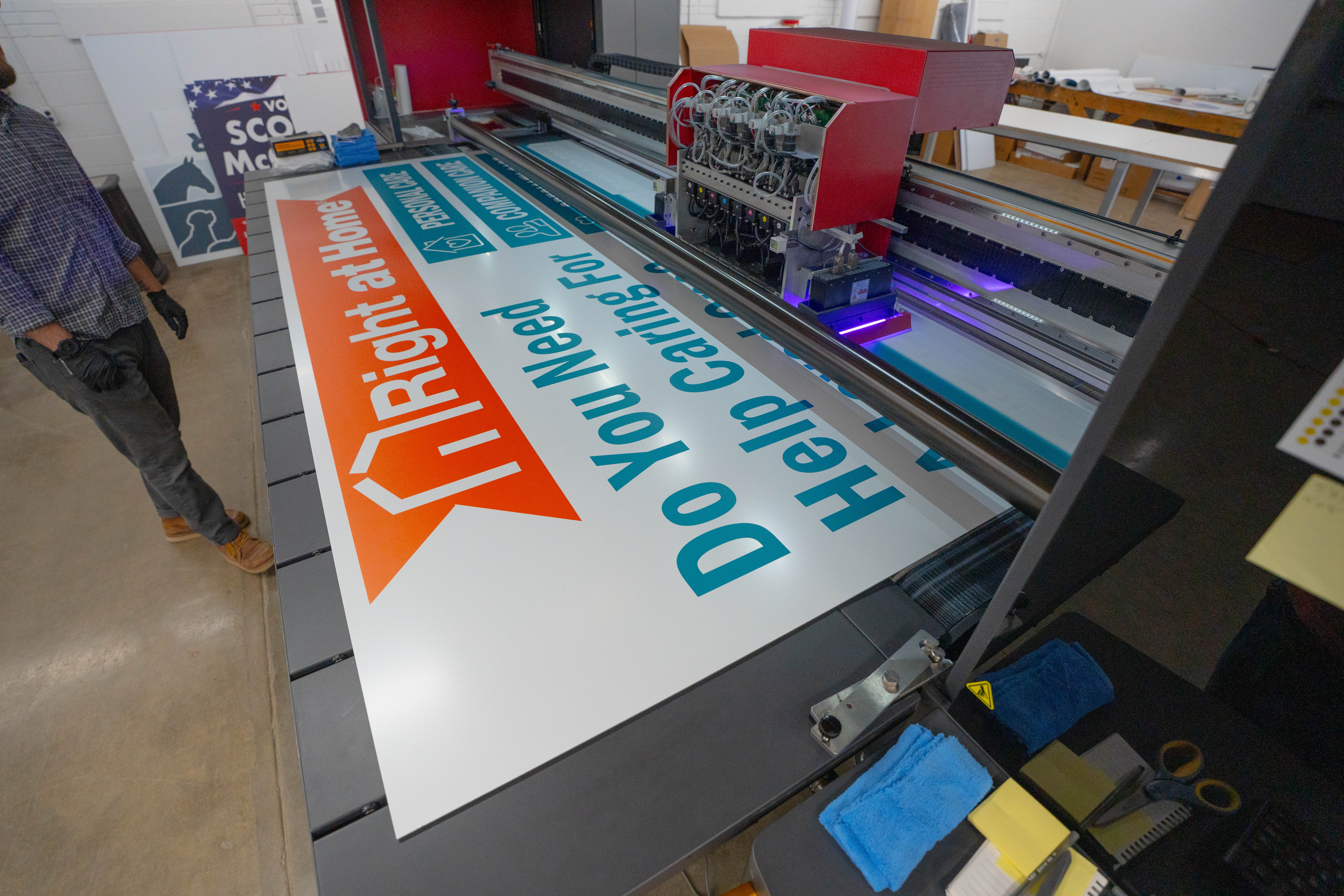 Right at Home sign on the flatbed printer